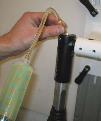 Fill telescope with oil from Bottom, while pulling