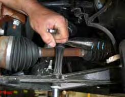 Remove the OEM tie rod ends from the OEM steering knuckles using a tie rod puller or similar tool.