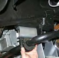 Note: Install the new sway bar end links with the pivoting end at the A-arm. (See Photo # 31) Photo # 28 32.