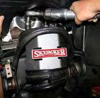 (See Photo # 23) 6" Lift: Install the lower mount of the strut assemblies using the OEM hardware.