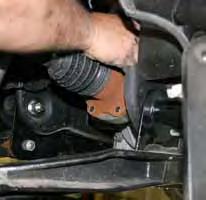 (See Photo # 24) Photo # 22 26. Attach the new Skyjacker steering knuckles to the upper & lower A-arms using the OEM hardware.