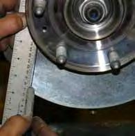 Measure 1/2" from the ends of the OEM outer tie rods & make a mark. Using a cut-off wheel or similar tool, cut along these marks.