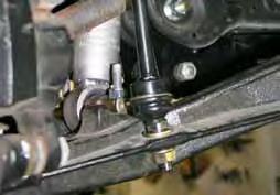 Note: If changing rear leaf springs, it will be necessary to lower the gas tank to gain access to the forward leaf spring bolt.