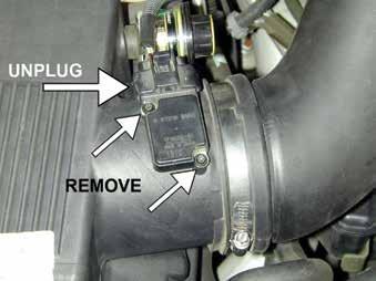 Loosen the hose clamp securing the intake resonator to the air intake tube. Remove the intake resonator from the engine bay. d.