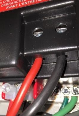 Step 5: Use a small Phillips Head screwdriver to remove four (4) front screws holding the Control Module to the front panel.
