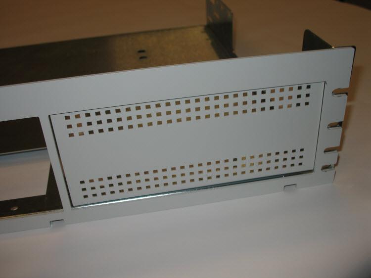 Align the front-panel plate with the threaded studs on the front panel. 2.
