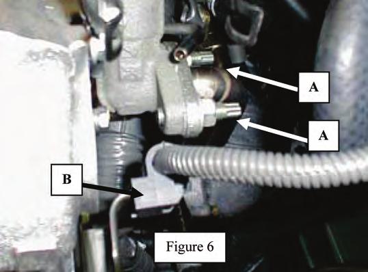 13. Disconnect EGR feed tube at EGR valve. See "A" arrows in Figure 6. 14. Disconnect EGR valve from intake chamber. 15.