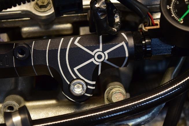 Install the fuel injectors into the fuel rail. To prevent failure, the O-ring MUST be lubricated prior to assembly. 16.