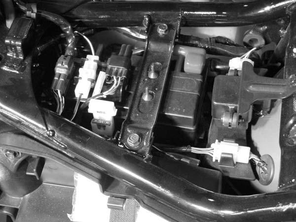 NOTE: It is not necessary to remove the fuel tank. It does however make the installation easier.
