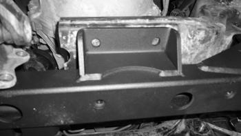 Center both of the cams if it is possible (recessed area is vertical above or below the bolt head, it may be required to