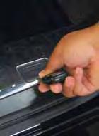 using your key to access the bolt for the spare tire