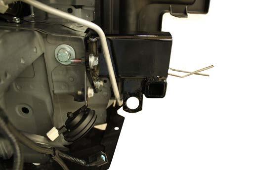Make sure the coolant line does not interfere with the attachment tab.