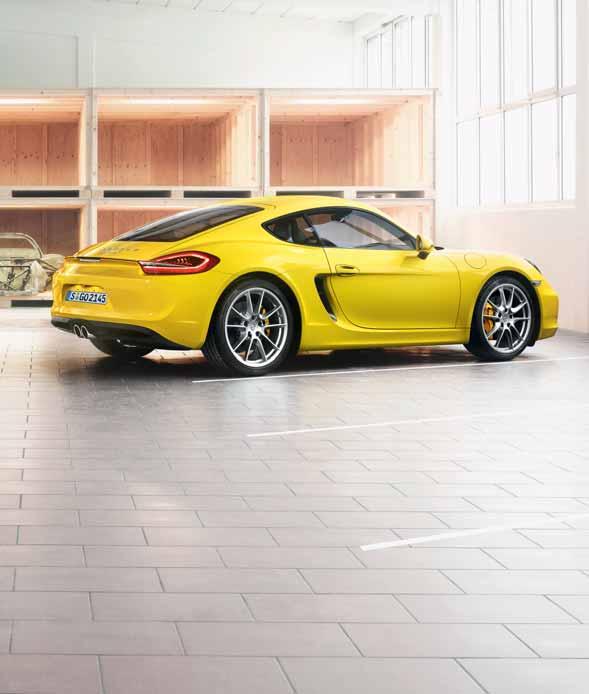 The new Cayman poses in the warehouse of the Porsche