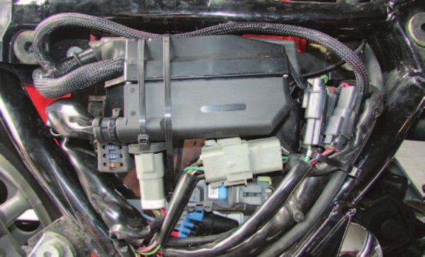 FIG.D 8 Plug the PCV harness into the stock wiring harness (Fig. D).
