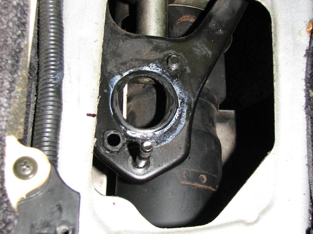 Shifter removed, Now mark location of rear shifter mounting hole on the body of your car while holding up on shift