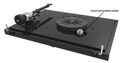 ADJUSTING THE PULLEY HEIGHT In rare instances, you may have to adjust the pulley height if it taps against the platter: Carefully remove platter and drive belt from the turntable.