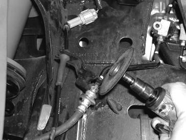 42. Reinstall the original brake rotor, followed by the brake caliper.