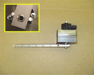 Figure 1a: Prepared WAS housing\connector Cut WC WAS shaft mounting hole c. Using hardware WF (screw) and WE (nut), attach the WAS arm WC to the WAS assembly.