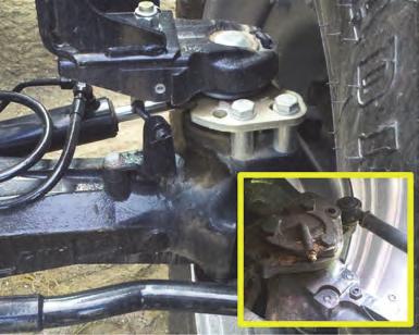 2. Mount the wheel angle sensor. The figures in this section show prototype brackets and fittings. Install your brackets and fittings as described. a. Identify the WAS assembly location on the left front axle (Figure 2a with inset).