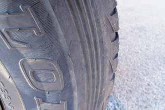 by kerbing Bulges, cracks or cuts to the tyres