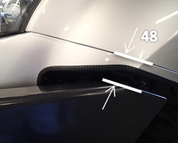 Position the bar so that the rear of the wing is parallel with the vehicle fender and lines up with the wheel arch.