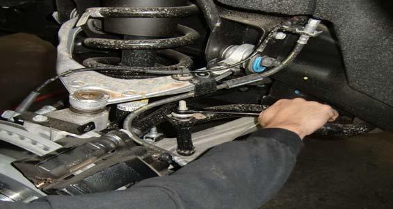 Remove the ABS from the upper control arm clip and frame rail.