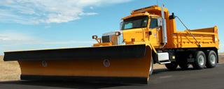 Runway Plow Truck Large Vehicle Description: Tandem-Axle Dump Truck with Plow Attachments: Runway Plow 22 Manufacturer: