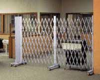 EXTRA HEAVY-DUTY FOLDING TRACK GATES Extra heavy-duty folding track gates provide access control and front-line security While locked they provide one of the strongest physical and visual barrier to