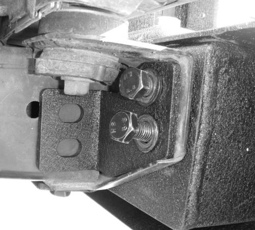 Figure. Figure.. Place drivers side-frame bracket in crossmember channel and line up holes (Figure 3).
