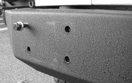 3. Using a supplied M x 60 bolt and washer, thread into upper left corner of the bumper and sub-frame