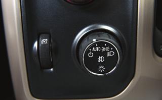 With the vehicle in Park, push down the lever F (B) closer to the instrument panel on the left side of the steering column to move the steering wheel in or out.