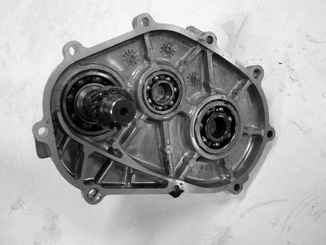 9. FINAL REDUCTION DOWNTOWN 125 i BEARING REPLACEMENT TRANSMISSION CASE COVER Remove the transmission case cover Remove the transmission case cover bearings by using the special tool.