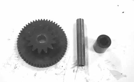 Remove the starter driven gear by turning the driven gear. Check the starter driven gear teeth for wear or damage.