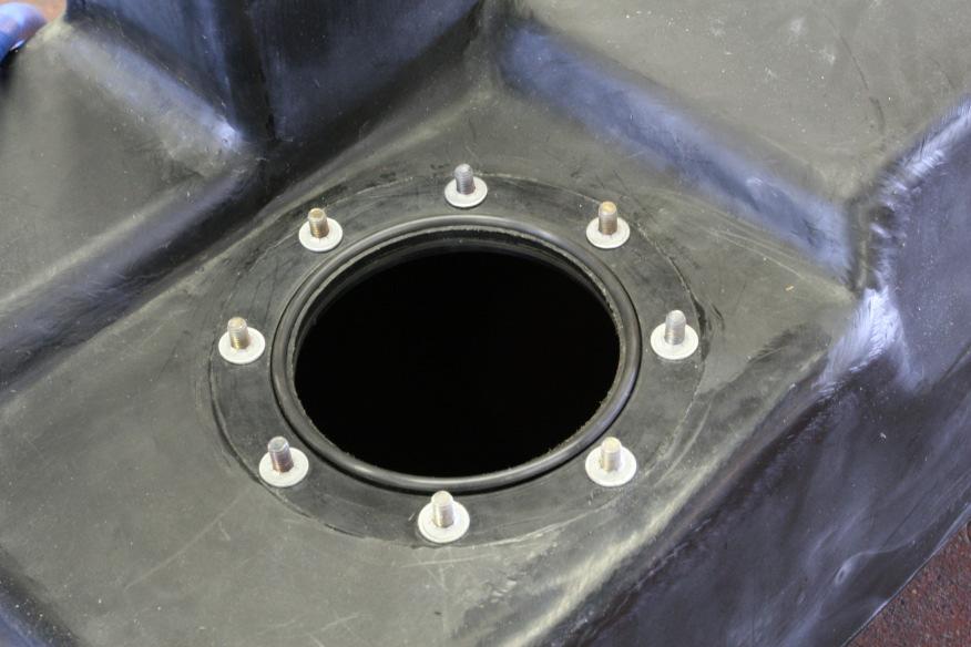 Note: Check the two ½ flanges mounted inside the tank to be sure the flat gasket is in place between the flanges and the inside top of the tank.