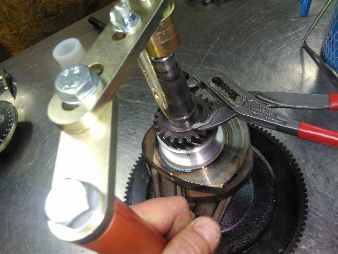 Turn the gear until the mark is in line with the tool. You have about 5 to 10 seconds.