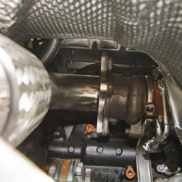 CC) 27 Re-install the engine cover by aligning the four (4) mounting posts and pushing