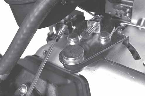 Adjust Carburetor Low Idle Speed (RPM) and Governed Idle Adjustment 1. Low Idle Speed (RPM) Setting: Place the throttle control into the idle or slow position.