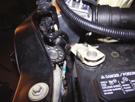 In the case if this distance is greater than 45mm, replace the thermostat. BUSHING INSPECTION 08. Check the upper radiator mounting peg bushings for damage.