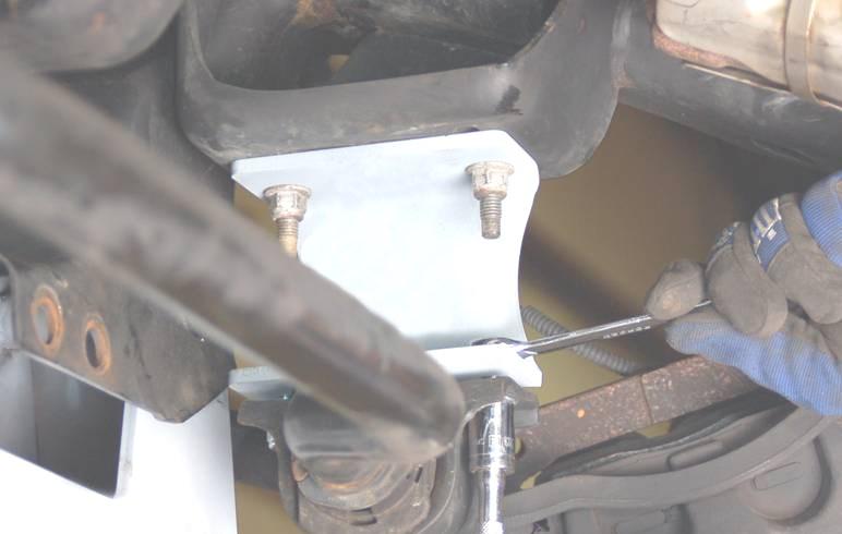At this time tighten all cross-member bolts using a mm and a /6 wrench and the rear differential bolt