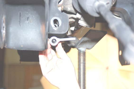 spacer above the rack and pinion to space the rack down. See Photo. 8.