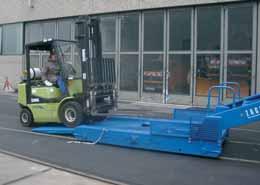 the unit. The forklift truck is employed as the driving element. The power transmission results form the driving gears of the forklift truck on four propulsion rollers similar to a brake test stand.