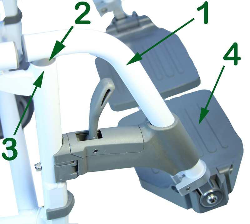 The foot plate height can be adjusted by loosening the footrest clamp (1), sliding the the foot plate extension tube (2) up or down