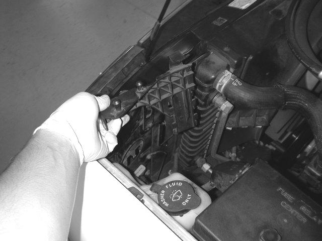 the AEM intake. g) Remove the lower air box mounting nut.