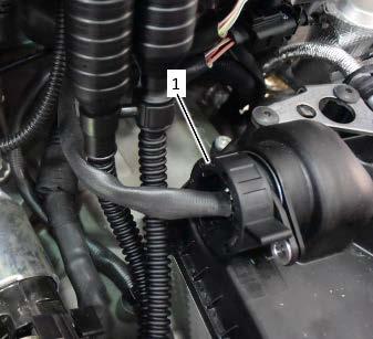 Route parking lock actuator connector wiring around ventilation hoses as shown.