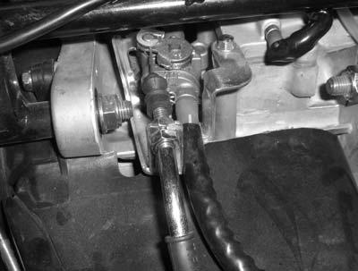 Free Play: 2~6mm 2~6mm Fuel Line Major adjustment of the throttle grip free play is made at the carburetor side.