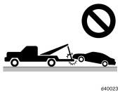 (c) Towing with sling type truck (c) Towing with sling type truck NOTICE Do not tow with sling type truck, either from the front or rear.