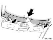 9. Pull down the convertible top with grasping the handle under the convertible top and push the latch handles fully forward until they are hooked.