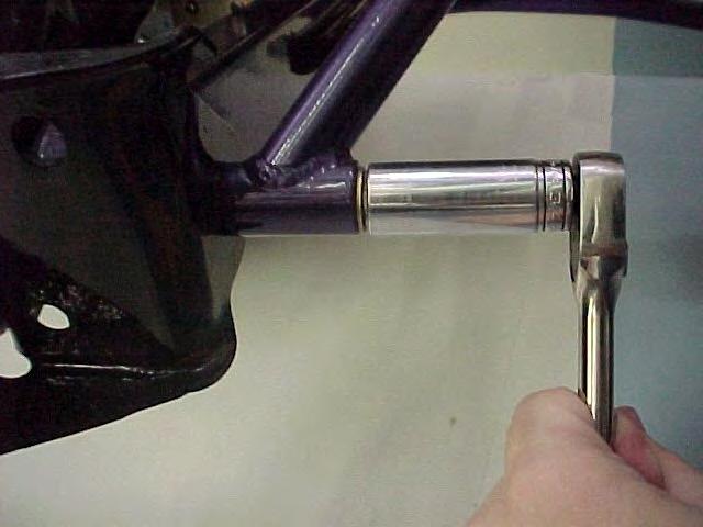 Hand-tighten the jamb nut on the brace. Place the washers included over the bolt ends and start the nylock nuts on the bolt ends to make sure the bolts don t pull out, and move on to the next step.
