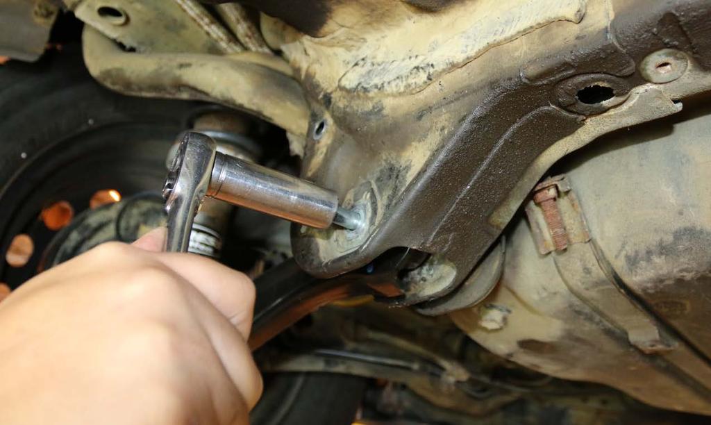 3. Remove the inner bolts from the lower control arms that attach to the rear sub frame and discard.