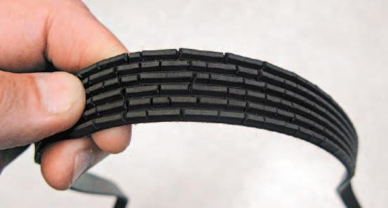 able. Place the measuring section of the gauge between the ribs of a serpentine belt. This can be done with the belt laid flat on the bench or installed on the vehicle.